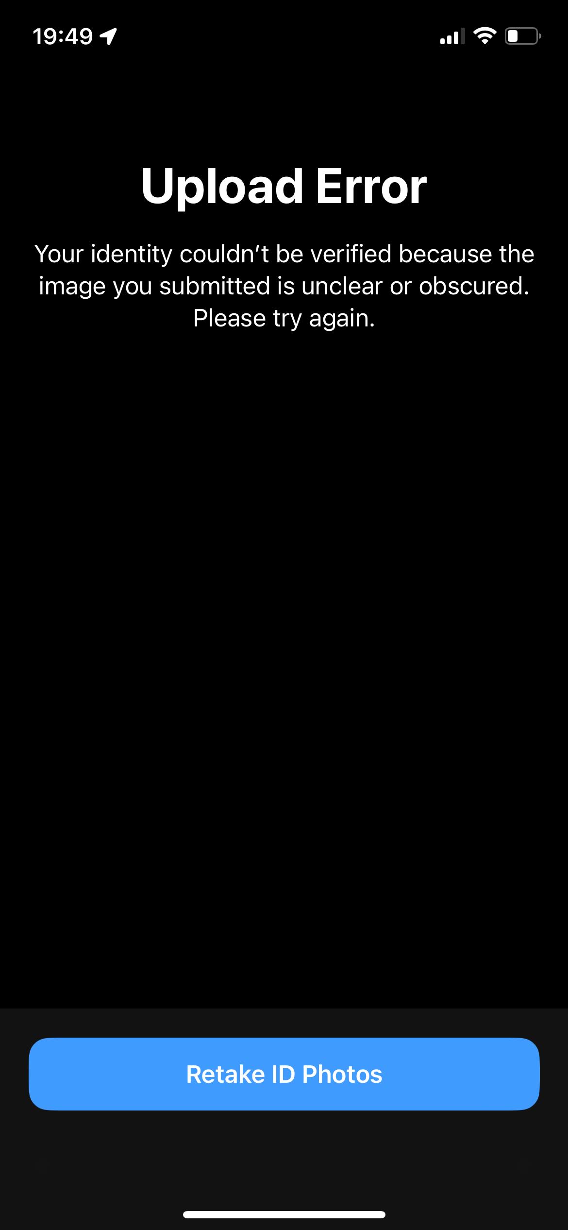 Screenshot of the Apple Developer App with a rejection message stating that my identity couldn’t be verified because they couldn’t read my ID
